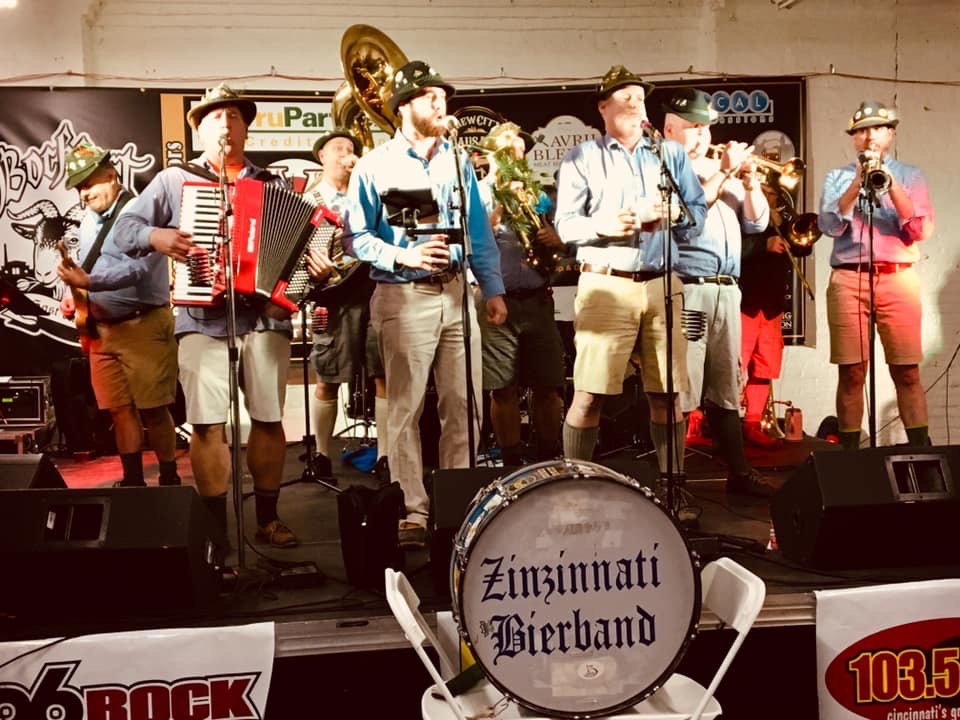 The Zinzinnati Bierband performing on stage with accordion, tuba, trumpet and bass drum